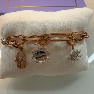 Chic Gold and Silver Charm Bracelet